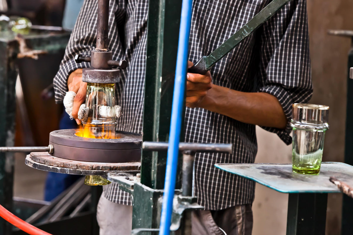 Artisan crafting handmade Moroccan Beldi glasses using traditional glassblowing techniques, House of Anouar