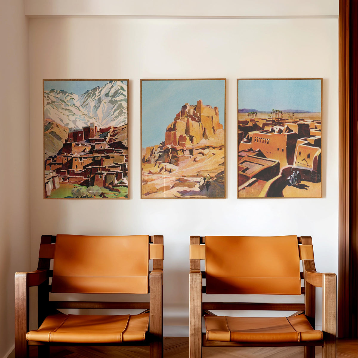 Atlas Mountains wall art triptych above leather chairs, House of Anouar