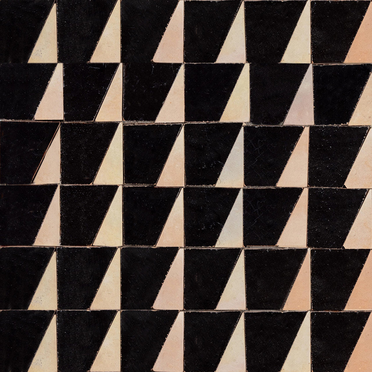 Black and natural triangle-cut zellige tile pattern, House of Anouar