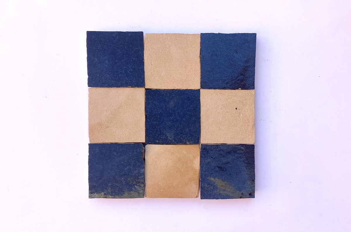 Blue and natural square zellige tiles in a checkerboard arrangement, House of Anouar
