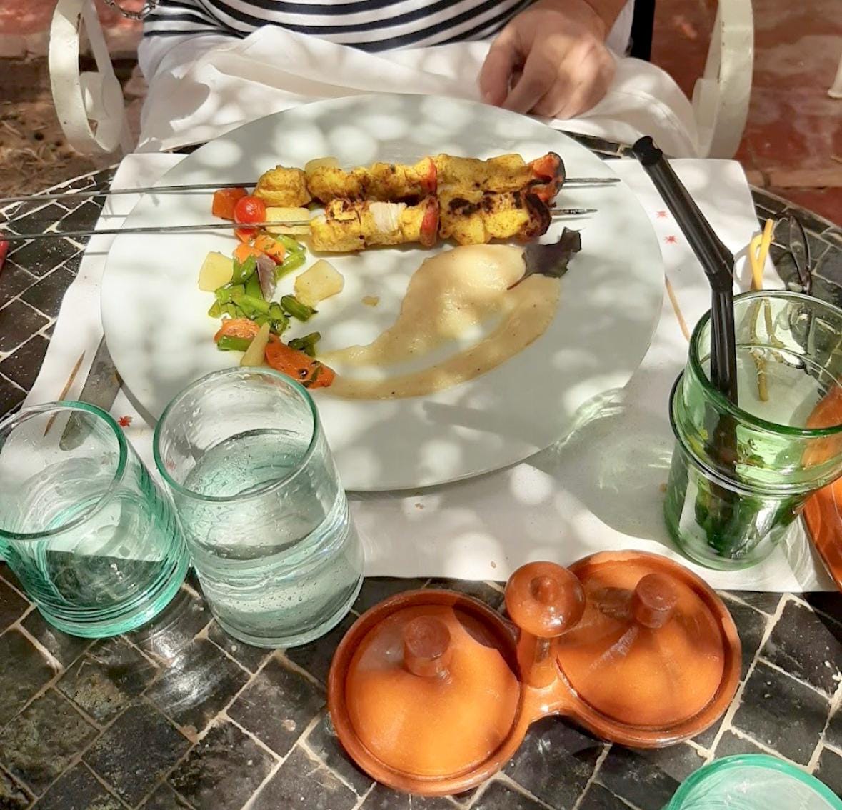 Clear and green Beldi glasses on a breakfast table, House of Anouar