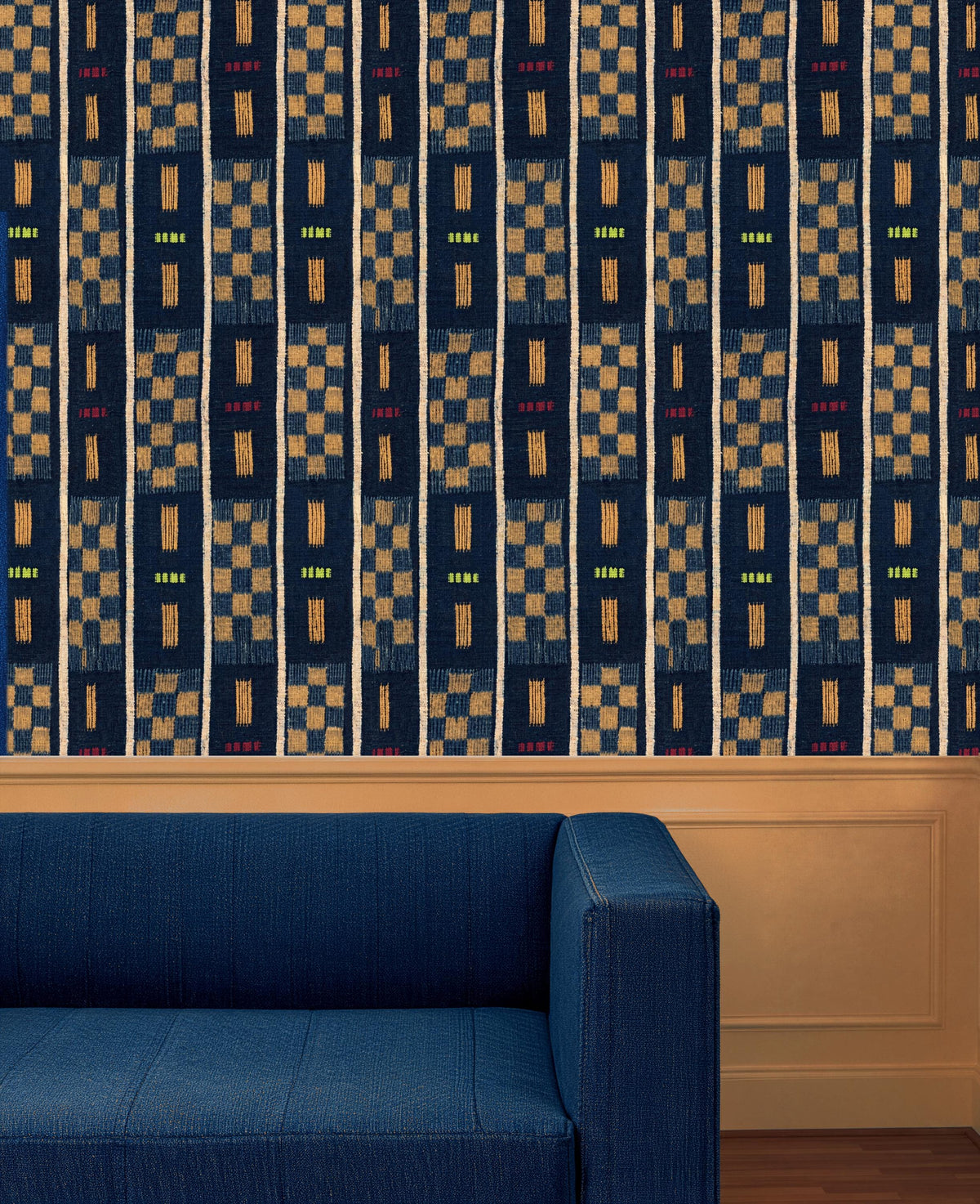 Indigo Baule checkered wallpaper above a blue sofa, House of Anouar