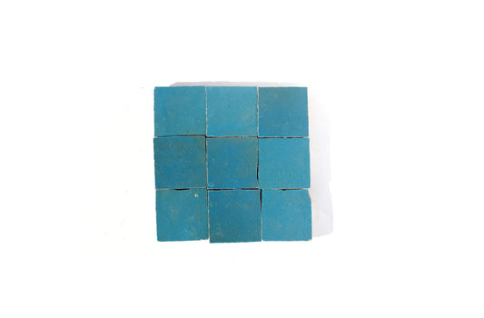 Nine handmade turquoise Moroccan Zellige tiles arranged in a grid, House of Anouar