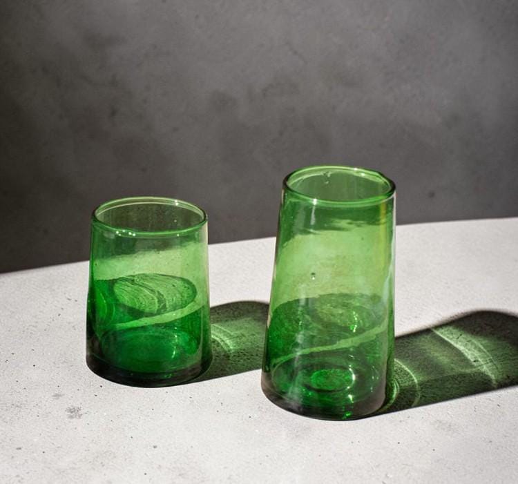 Two green Beldi glasses on a stone surface, House of Anouar