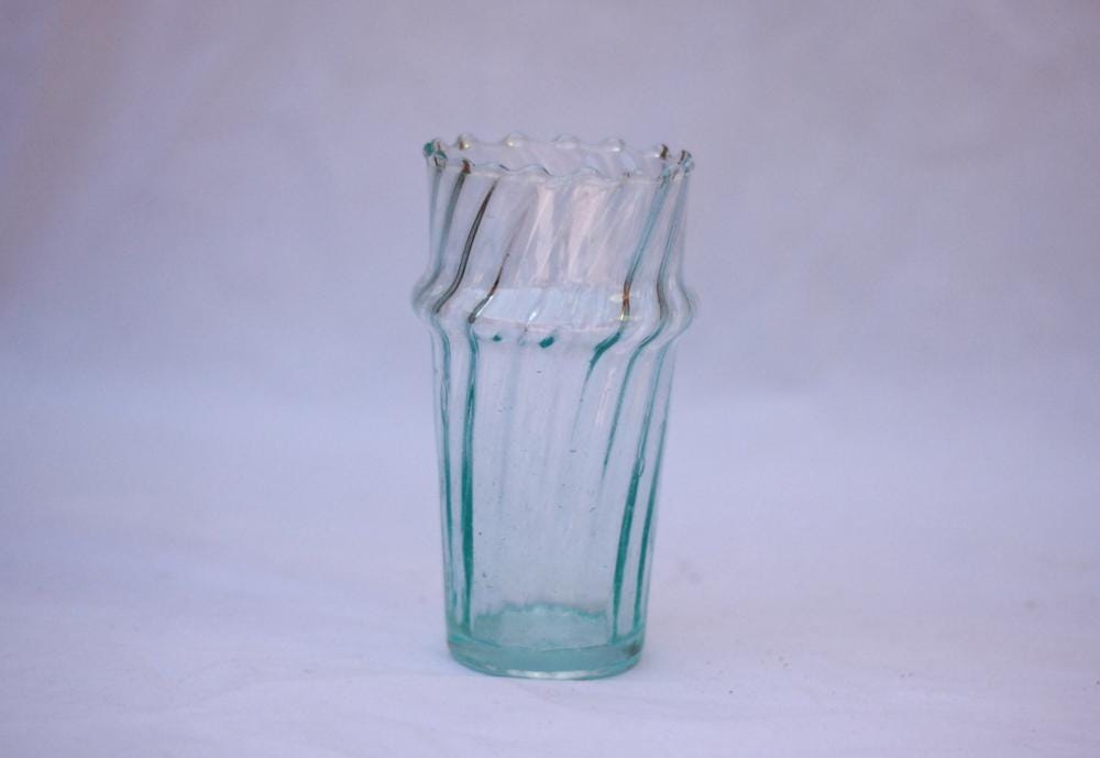 Two stacked clear fluted Beldi glasses, House of Anouar