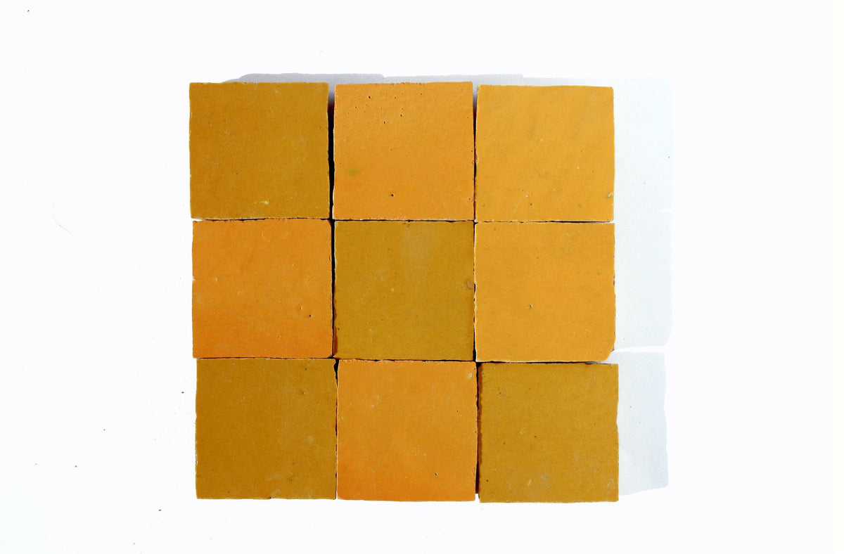 Yellow square Moroccan zellige tiles arranged in a grid, House of Anouar